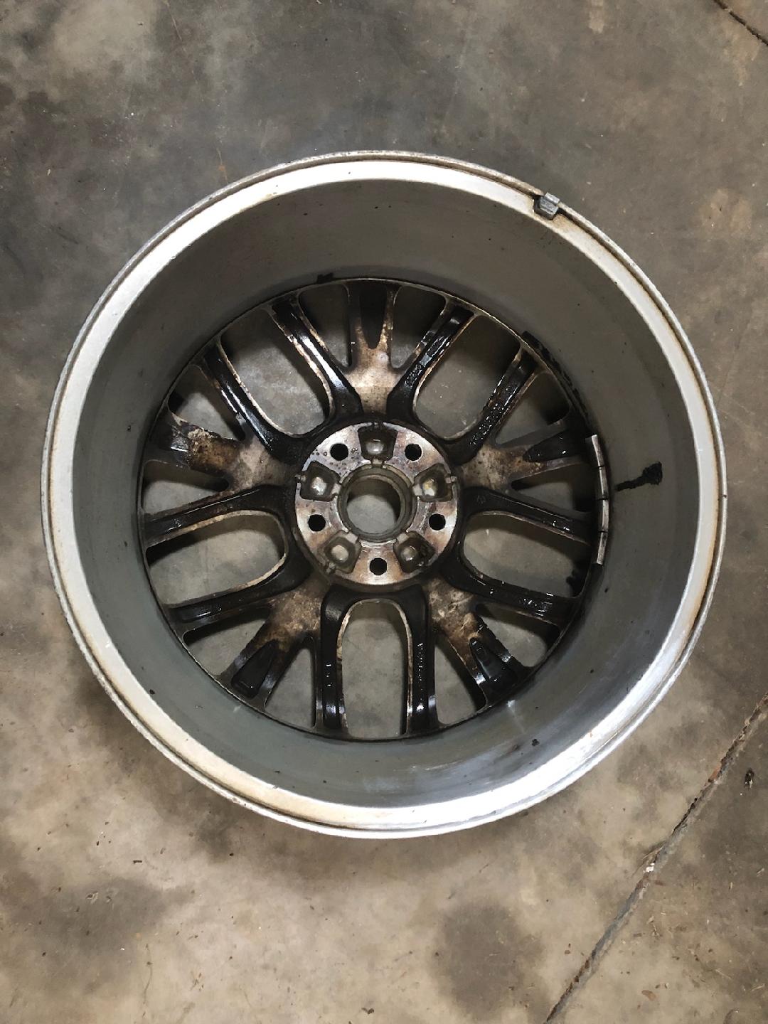 Black chrome multi-spoke wheel close up