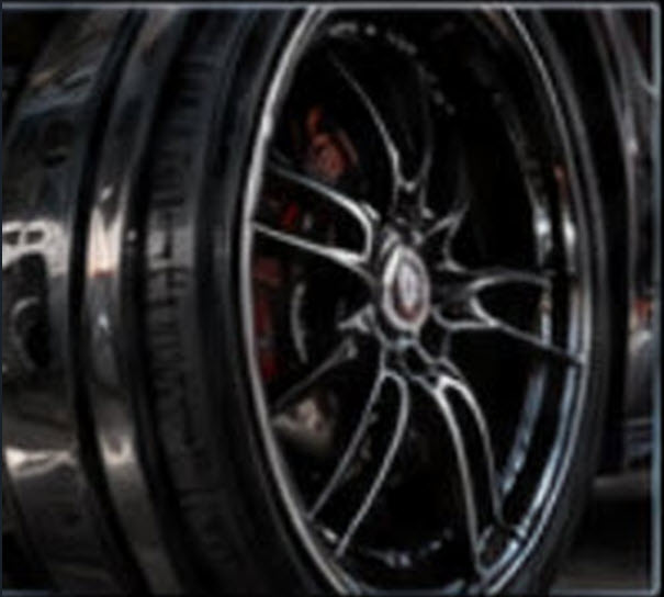 Black chrome multi-spoke wheel close up