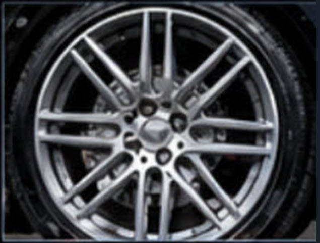 Off-road wheel with red brake caliper and all-terrain tire